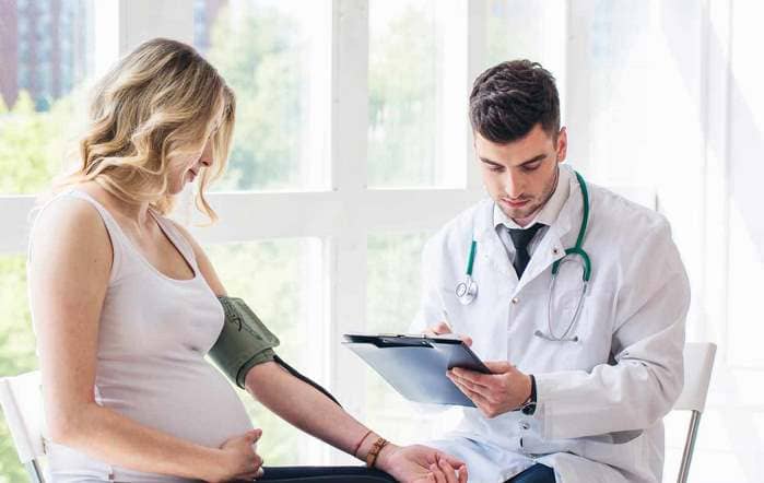 При пониженном давлении болит голова при беременности