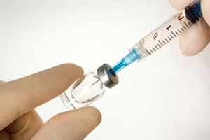 почему болит спина после прививки